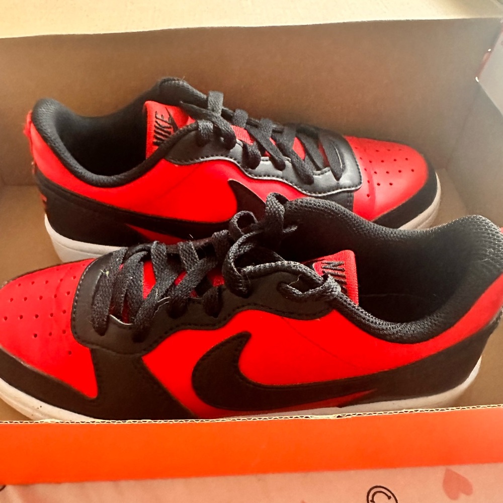 NIKE dunk lows red and black size 4y (converts to 5 women’s)